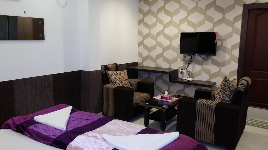Capital Suites Bangalore Bagian luar foto