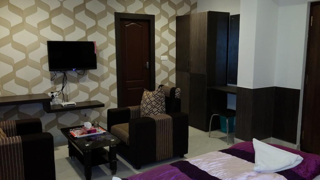 Capital Suites Bangalore Bagian luar foto
